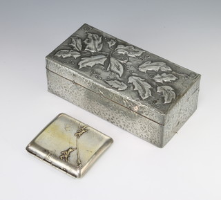 A silver plated repousse cigarette case with hunting scene and an antimony box 