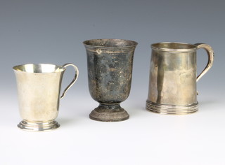 A silver tapered mug with S scroll handle London 1917, 1 other and beaker, 416 grams  