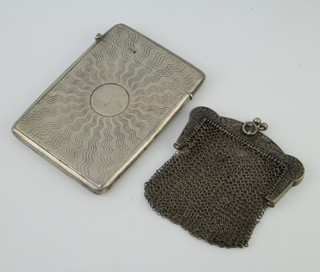 An Edwardian chased silver card case Birmingham 1904 and a silver mesh purse 98 grams