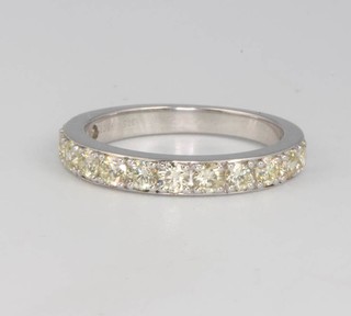 A 9ct white gold 13 stone diamond 3/4 eternity ring 0.93ct size M 