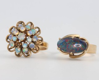 A yellow gold opal ring size N 1/2 and a gem set 9ct gold ring size O 