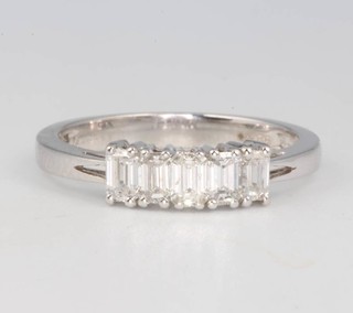 An 18ct white gold 5 stone baguette diamond ring 0.78ct size O 
