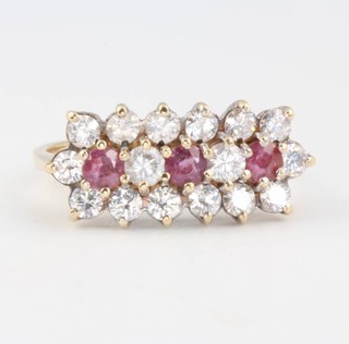 A 9ct yellow gold and ruby cluster ring size M 1/2