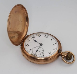 A 9ct yellow gold hunter pocket watch with seconds at 6 o'clock 