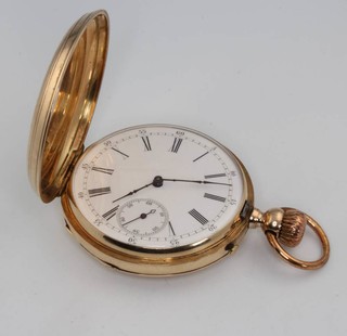 A gentleman's gold plated hunter pocket watch with seconds at 6 o'clock  