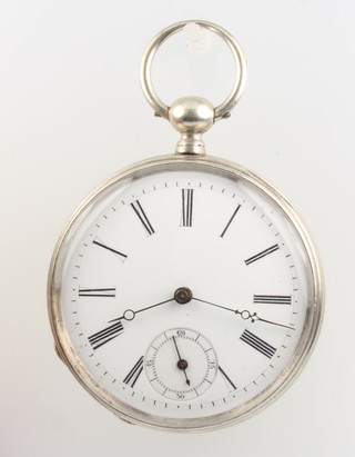 A silver key wind pocket watch with seconds at 6 o'clock 