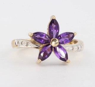 A 9ct gold amethyst and diamond floral ring size M 