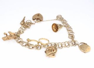 A 9ct yellow gold charm bracelet 17.2 grams 