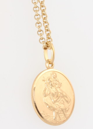 A 9ct yellow gold St Christopher pendant and chain 12.2 grams 