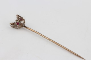 An Edwardian gem set fox head tie pin
