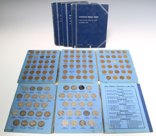 Five folders of American coinage 

