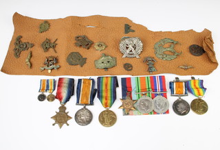 A Word War One trio of medals to MS/3551 DVR.H.Hill.A.S.C., a pair to H.H.Williams and other medals and badges 