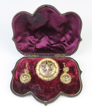A mid Victorian gold enamel and seed pearl brooch and matching drop earrings in a fitted case 