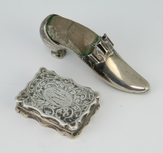 A Victorian silver pin cushion in the form of a shoe Birmingham 1899 65mm together with a rectangular vinaigrette 