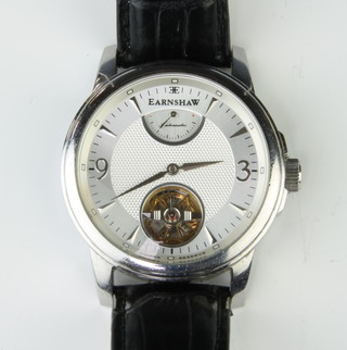 A gentleman's steel cased Earnshaw automatic wristwatch with visible movement on a leather strap, boxed 