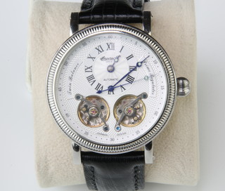 A gentleman's steel cased Ingersoll automatic wristwatch with visible movement and subsidiary dial with black leather strap, boxed