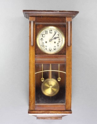Hamberg American Clock Company, a striking wall clock with 16cm dial and Arabic numerals contained in a mahogany case 