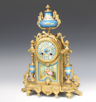 A D Mugin, a 19th Century French 8 day striking mantel clock contained in a gilt spelter case with Sevres style porcelain panels and Roman numerals 