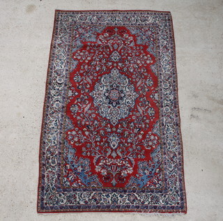 A red and blue ground Persian Saraighmahal rug 226cm x 132cm 