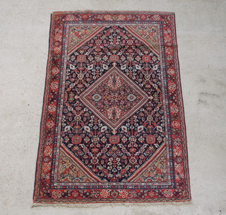 A blue and red ground Persian Mahal rug with diamond to the centre within multi row border 204cm x 134cm 
