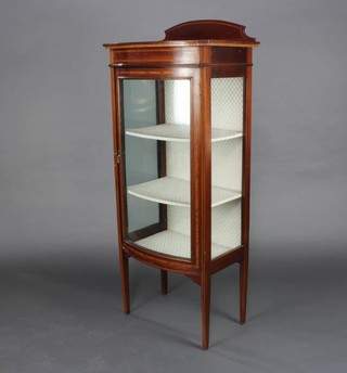 An Edwardian inlaid mahogany bow front display cabinet with raised back, fitted shelves enclosed by bow front glazed panelled doors, raised on square tapered supports 139cm h x 59cm w x 40cm d 