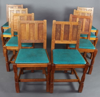 Colin Almack (The Beaverman), a set of 8 carved oak dining chairs with panelled backs and upholstered drop in seats, raised on turned and block supports, made for the current owner in 1963 
