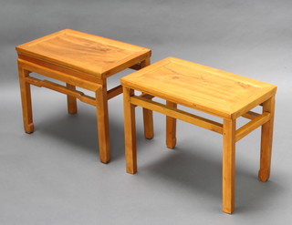 A pair of Chinese light Padauk rectangular stools/occasional tables raised on tapered supports 49cm h x 60cm w x 38cm d 