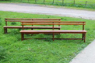A pair of 19th Century pine rectangular benches raised on 6 tapered supports with H framed stretcher 77cm h x 250cm l x 30cm w 