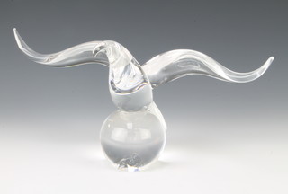 A Studio Glass figure of an eagle sitting on an orb 17cm 