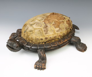A Victorian carved oak footstool in the form of a turtle with upholstered seat 14cm h x 42cm w x 26cm d