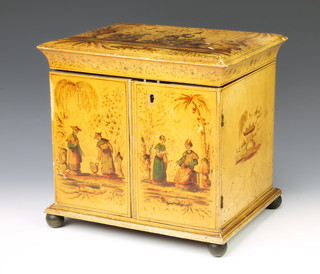 A Victorian chinoiserie style table top sewing cabinet with hinged lid and fitted interior, the base fitted 2 cupboards enclosed by a panelled door, the interior fitted 3 long drawers with turned handles, raised on bun feet 28cm h x 29cm w x 24cm d 