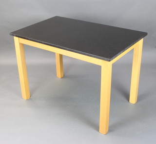 A rectangular beech framed kitchen table with black veined marble top, raised on square tapered supports 75cm h x 110cm l x 70cm w 