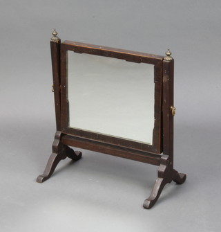 A Georgian rectangular mahogany toilet mirror contained in a swing frame with later replacement glass 38cm x 36cm w x 21cm d  