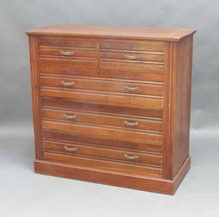 An Edwardian walnut chest of 2 short and 3 long drawers, raised on a platform base 101cm h x 103cm w x 49cm d 