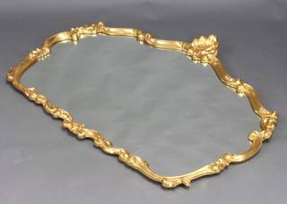 A Rococo style shaped plate wall mirror contained in a decorative gilt frame 92cm x 120cm 
