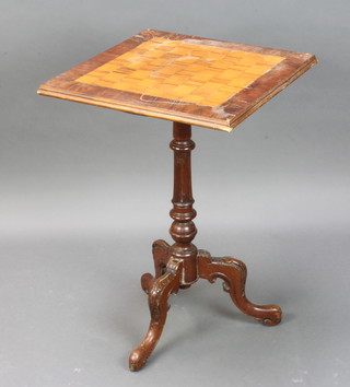 A Victorian inlaid rosewood games table, the top inlaid a chessboard, raised on a mahogany turned and fluted support with tripod base 70cm h x 47cm w x 47cm d 