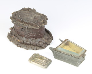 A 19th Century metal vesta case decorated a lady and gentleman gardener 5cm x 3cm, a Victorian metal and oval glass wedge shaped trinket box 8cm x 4cm x 3cm and a Victorian oval carved wooden trinket box in the form of a tree stump 6cm x 12cm x 10cm  