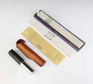 A Otis King calculator  no.Y1961 complete with a leather case and instructions, a Unique Universal slide rule boxed, 1 other slide rule and an energy converting units table 