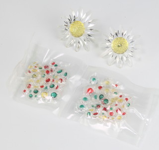 Two Swarovski Crystal Margarite Daisy yellow centre flowers and smaller loose ditto, boxed 
