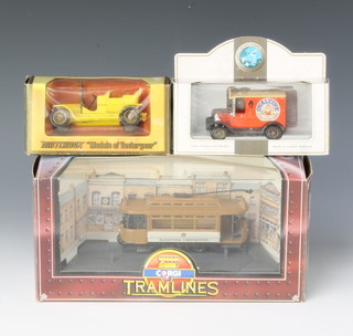 A Matchbox model of Yesteryear Y1 1911 model T Ford, a Corgi Tramlines model tram and a Lledo promotional model of an Ovaltine delivery van
