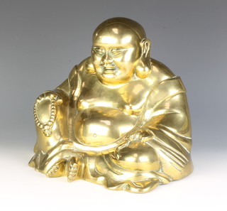 A gilt bronze figure of  seated Buddha 24cm x 30cm x 20cm 