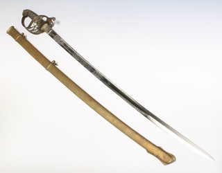 A Victorian Henry Wilkinson 18th Royal Irish Officer's sword, the blade etched Royal Cypher and monogram, complete with brass scabbard 