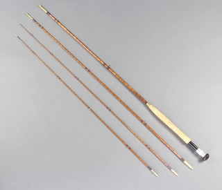 A Hardy gold medal split cane 3 section fly fishing rod, complete with spare tip 