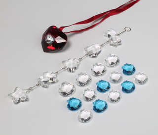 A Swarovski Crystal 5 section Christmas decoration together with 10 clear shells and 5 blue shells, boxed