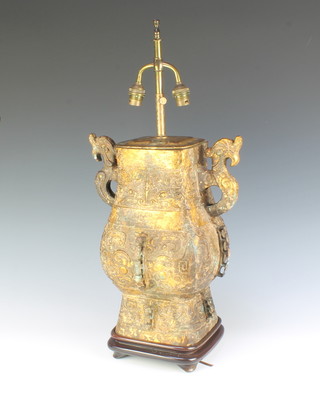 A Chinese style gilt metal table lamp in the form of a twin handled urn, raised on a wooden base 33cm h x 20cm w x 19cm d 