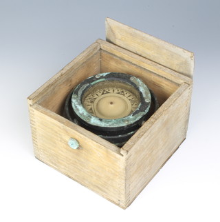 A Sestrel gimbled compass 10c, contained in an oak box with sliding lid 