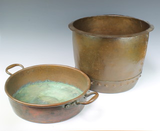 A circular copper copper marked H8H 33cm x 45cm together with a copper twin handled preserving pan 10cm x 16cm 
