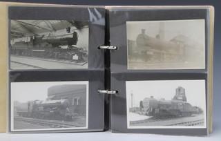 Ninety eight black and white and colour postcards of locomotives 