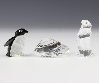 A Swarovski Crystal penguin mini 010027/7661033000 by Max Schreck 4cm, a marmot 289305/7608000005 by Heinz Tabershofer 5cm and top shell renewal gift 2007 8806939100000065 by Heinz Tabershofer 5cm, boxed 