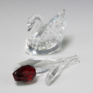 A Swarovski Crystal tulip - red 657109/94602000003 by Keiko Arai 9cm and swan centenary 187407/7633100000 1995 by Anton Herzinger 5cm 